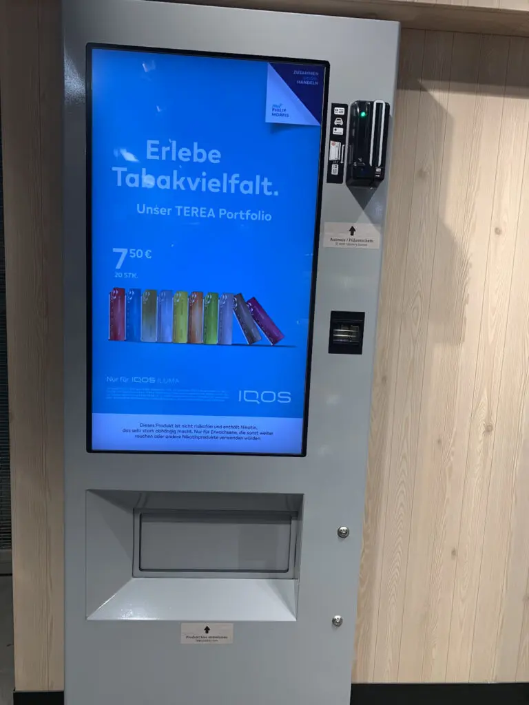 Shoppers identify themselves with an ID card or driving licence before the machine releases tobacco products, thus automating regulated sales.