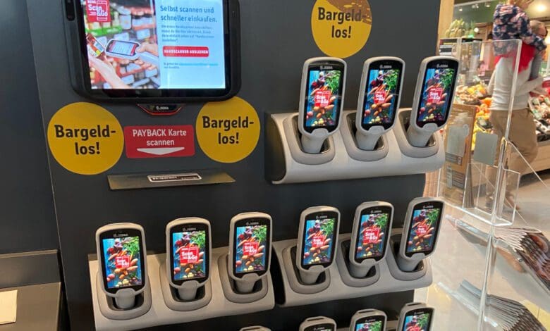 Self-scanning is making slow progress in Germany. Retailers' scanners — here at Rewe in Wiesbaden-Erbenheim — are used more often than customers' smartphones. (Photo: Retail Optimiser)