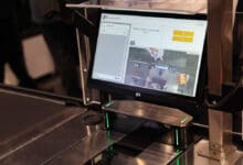 Diebold Nixdorf's fraud prevention software detects operating errors at SCOs, for example, when customers pass an item past the scanner without actually scanning it, when the barcodes of products are exchanged or when a customer leaves the checkout area without paying. (Photo: Diebold Nixdorf)