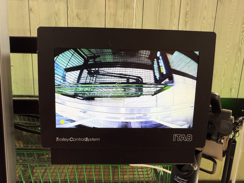 Itab's Trolley Control System scans shopping baskets at Edeka Aschoff's attended checkout and helps the staff to recognise forgotten or concealed items. (Photo: Edeka Aschoff)